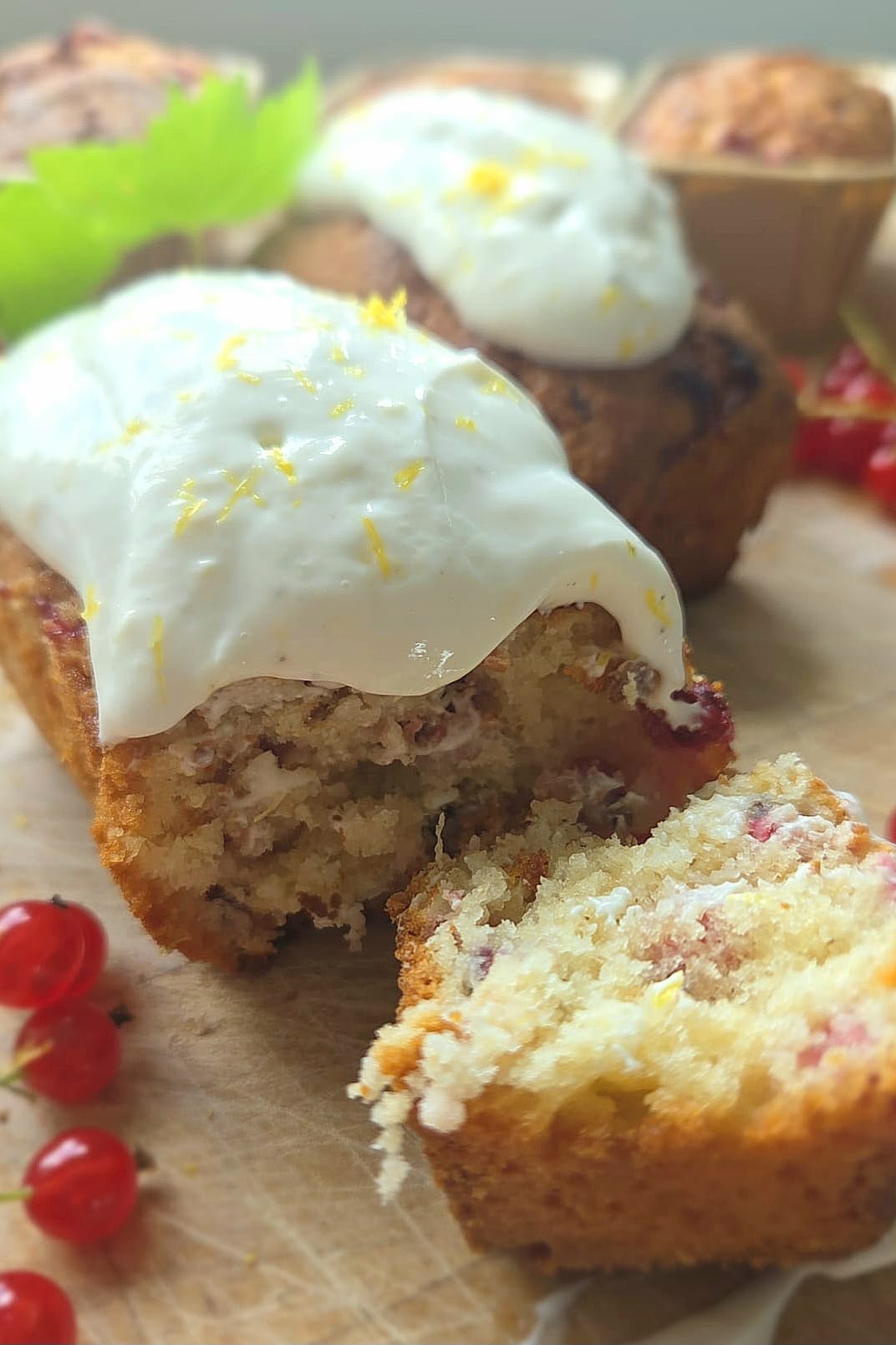 Sourdough discard mini loaves with redcurrants and lemon vanilla Greek yogurt glaze in paper molds