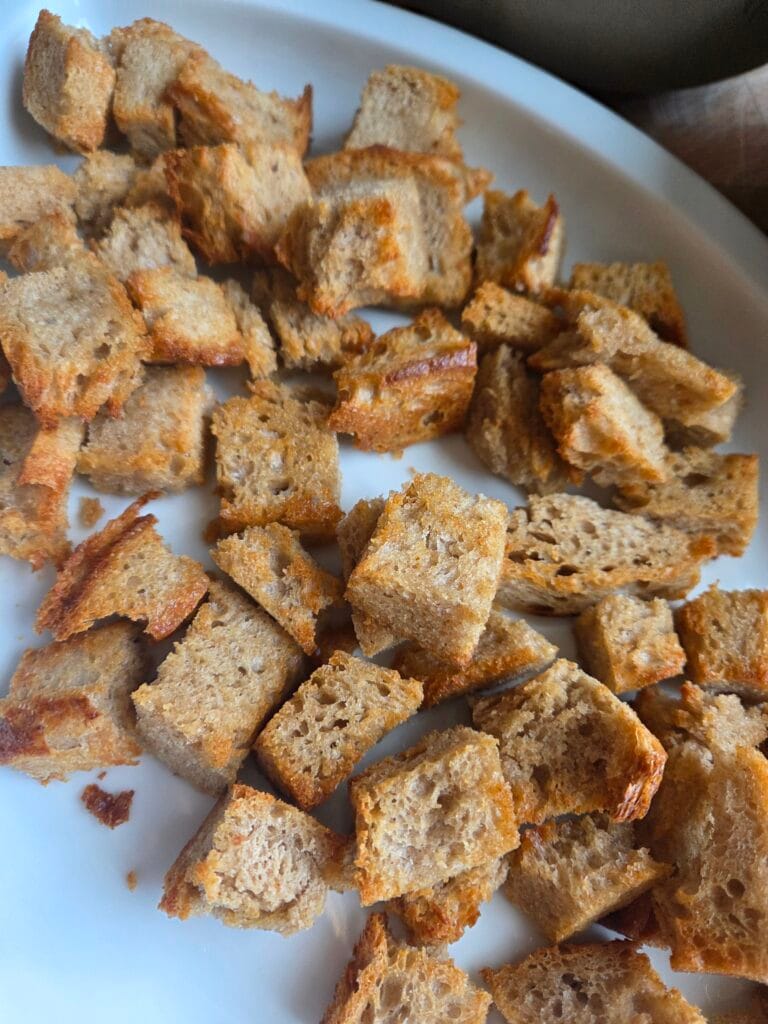 Crisp sourdough croutons made from day-old bread for bread salad
