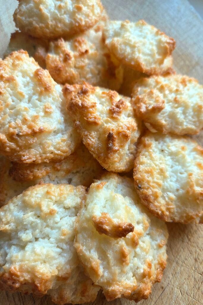 Norwegian coconut macaroons on a wooden board, ready to store or freeze