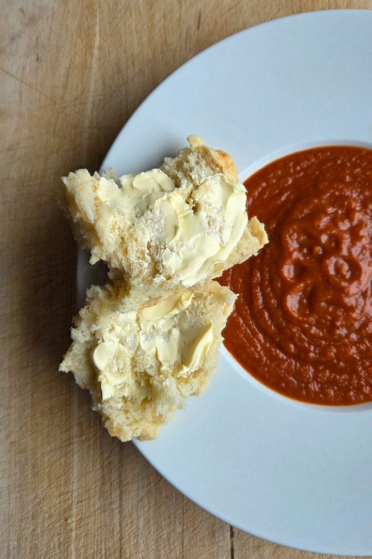 Cheese scones with Jarlsberg, baked as one golden slab and cut into squares with browned cheese on top