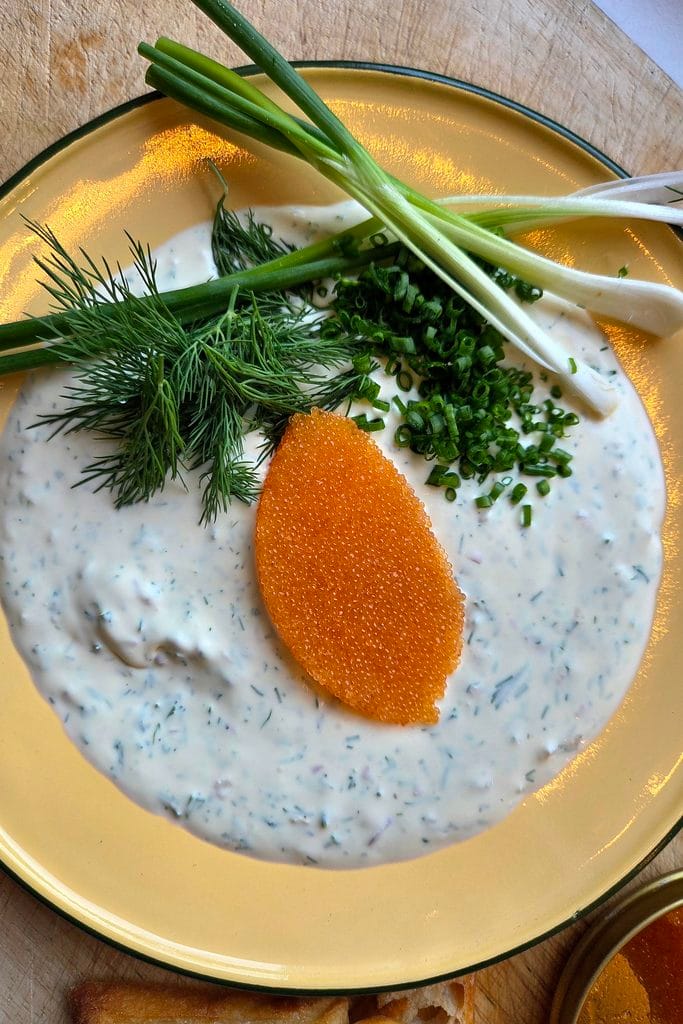Golden roe served with dill sour cream and sourdough chips