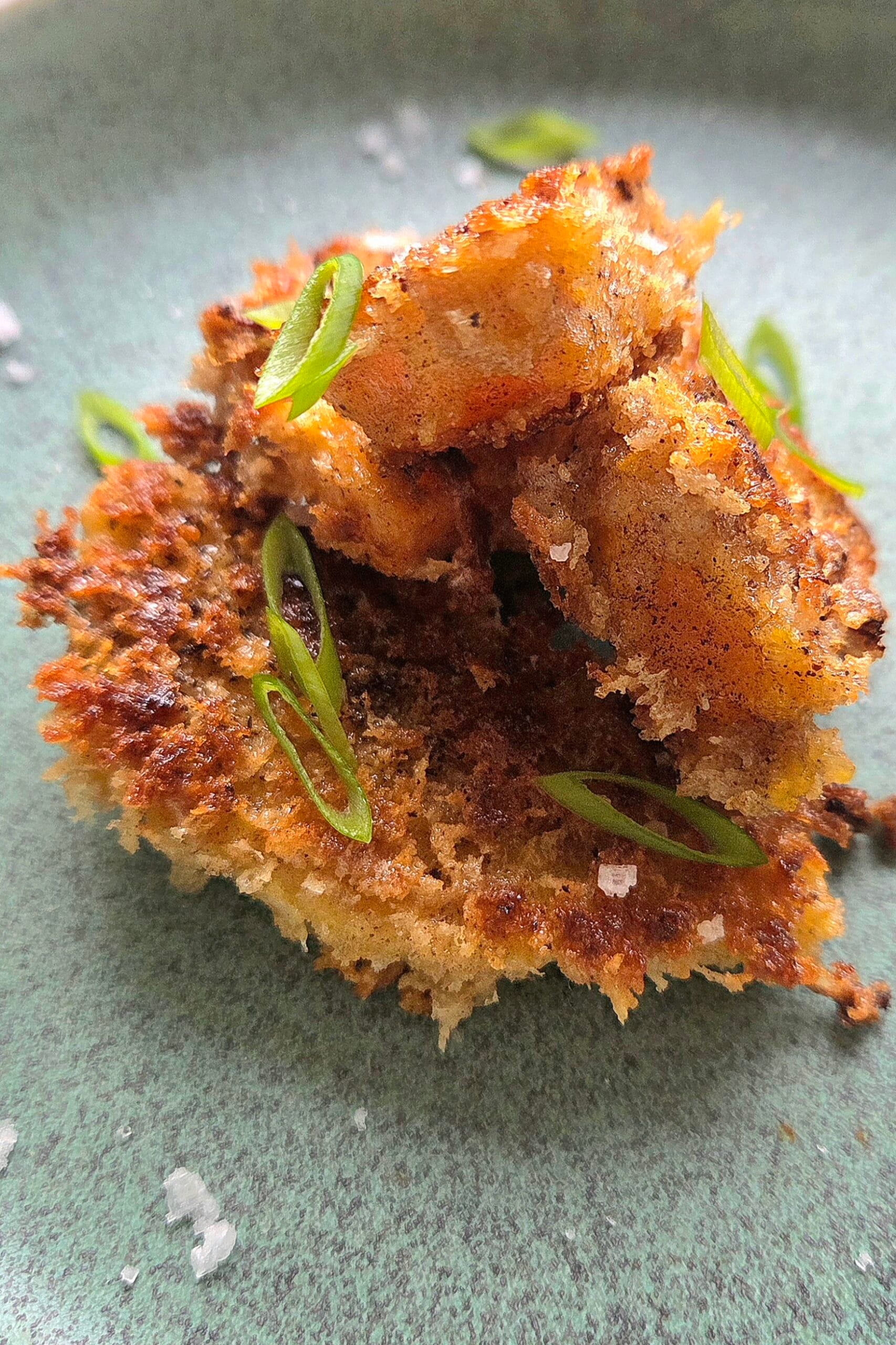 Golden panko-fried root vegetables made with homemade sourdough panko, topped with spring onion and flaky salt
