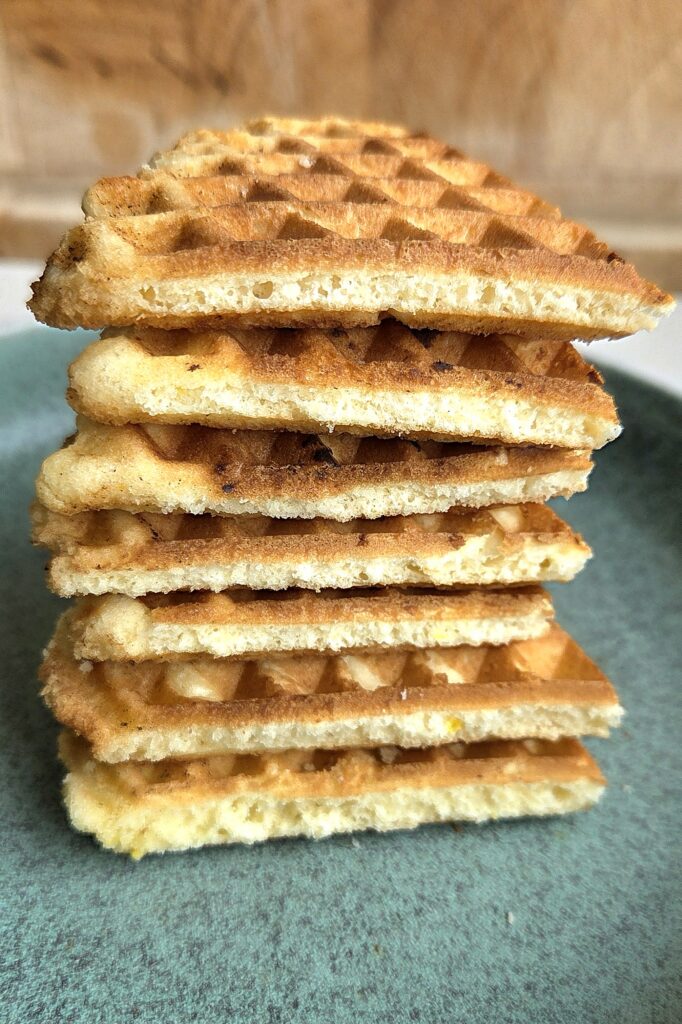 Stack of crispy Norwegian waffles showing their thin, snappy layers